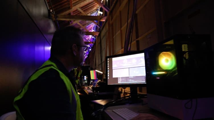 A Solder technician working on the installation display