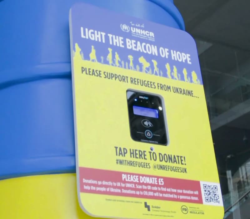 Close-up photo of the Beacon of Hope lighthouse with embedded contactless donation sensor