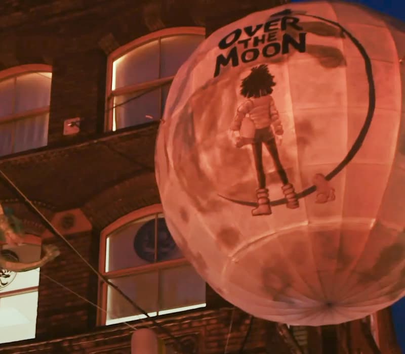 A photo of a Chinese lantern with the logo of the Netflix film Over the Moon